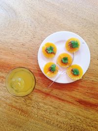 High angle view of dessert on wooden table