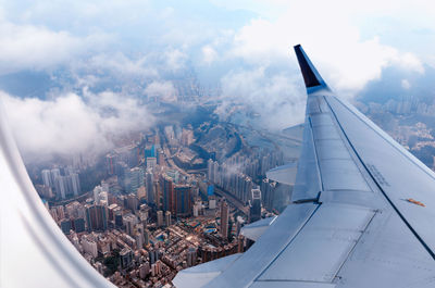 Aerial view of cityscape against sky