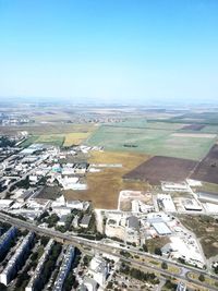 High angle view of buildings against clear sky