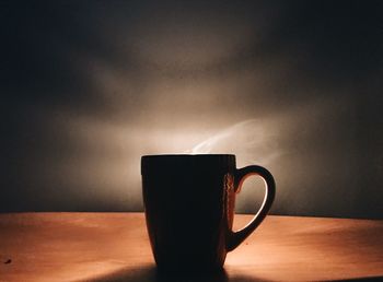 Close-up of coffee cup on table