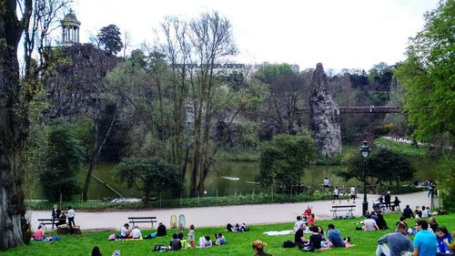 People relaxing in park