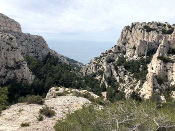 Scenic view of rocky mountains against sky