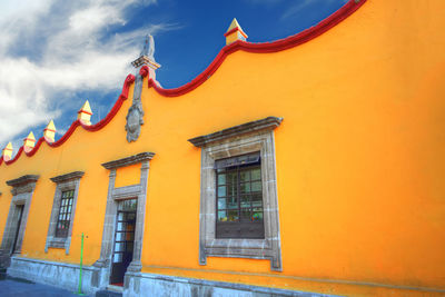 Low angle view of yellow building