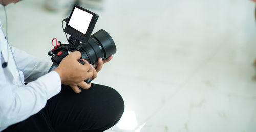 Close-up of man using mobile phone