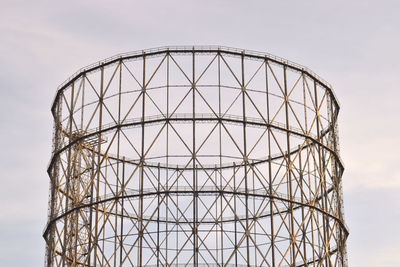 Low angle view of metallic structure against sky