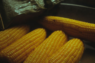 Full frame shot of yellow chili peppers on table