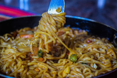 Close-up of noodles served in bowl