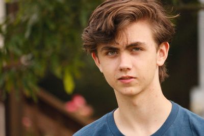 Close-up portrait of handsome young man