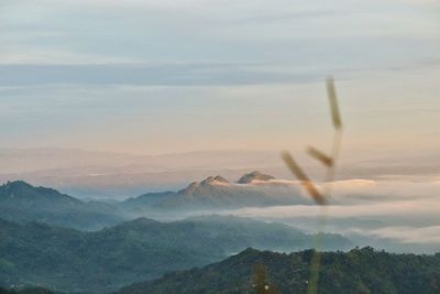 Scenic view of mountains against sky during sunset