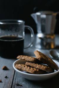 Close-up of cookies and coffee on table