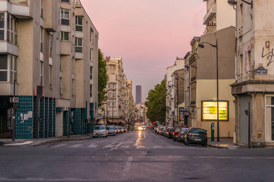 Cars parked in front of building