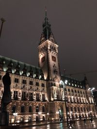 Low angle view of illuminated building at night