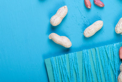High angle view of pills on blue background