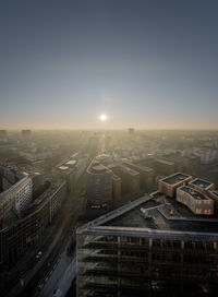 High angle view of street amidst buildings against sky