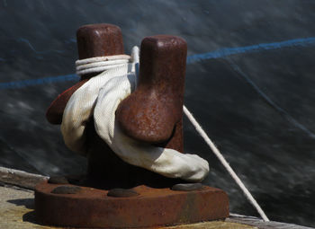 Close-up of rope tied on cleat