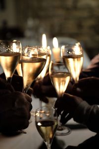 Close-up of hand holding wine glasses