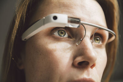 Woman wearing optical head-mounted display