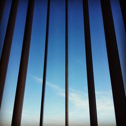 Low angle view of metal structure against sky