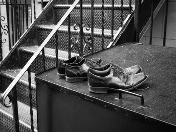 Close-up of shoes on steps