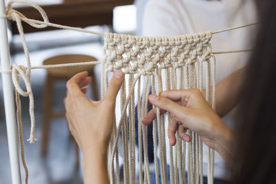 Close-up of woman making art product