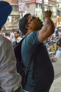 People standing on street in city