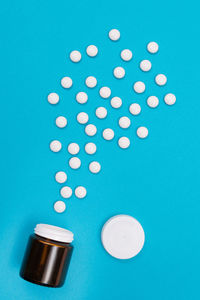 High angle view of blue paint on white background