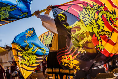 Man waving flag at parade