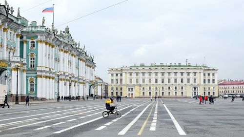 People at palace square in city