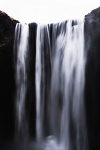 Close-up of waterfall along rocks