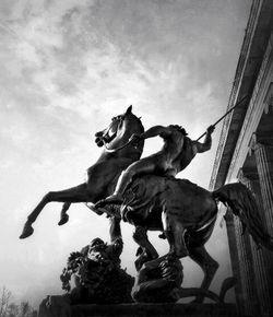 Low angle view of statue against sky