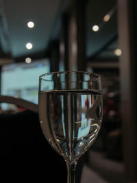 Close-up of wine glass on table