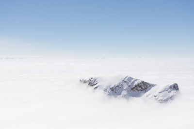 Aerial view part of the peak at range of zugspitze alps over the cloud.