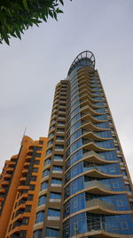 Low angle view of modern building against sky