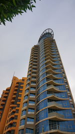 Low angle view of modern building against sky