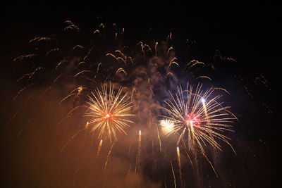 Firework display at night