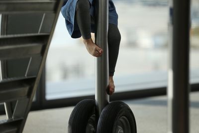 Low section of girl exercising in gym