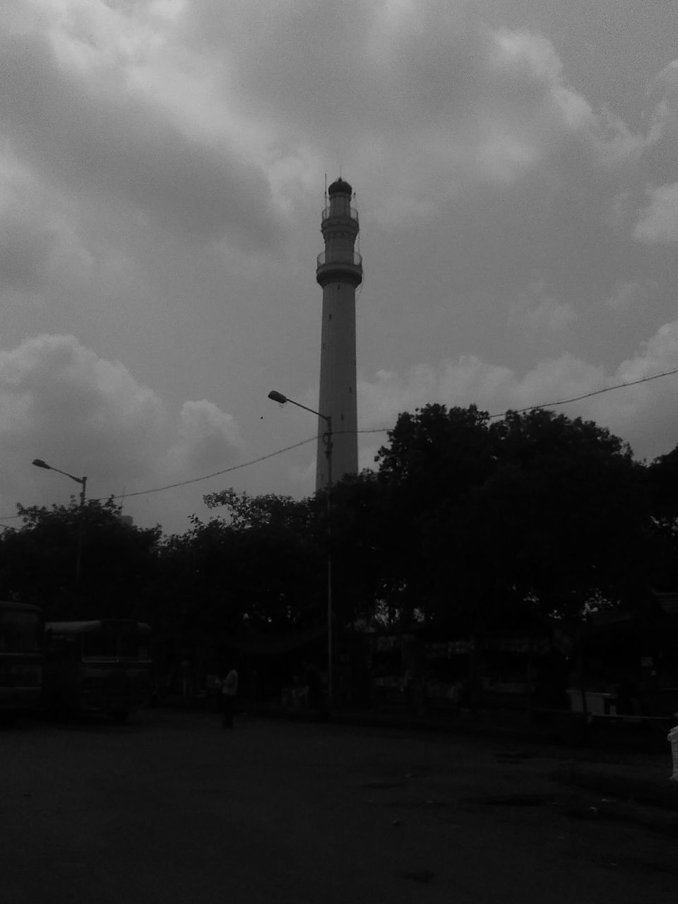 built structure, building exterior, architecture, sky, cloud - sky, tower, building, nature, tree, direction, guidance, plant, no people, tall - high, lighthouse, outdoors, day, low angle view, protection, security