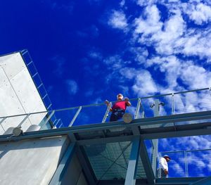 Low angle view of built structure against blue sky
