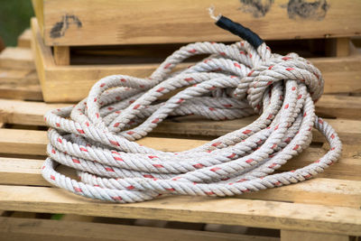 Close-up of rope on wooden table