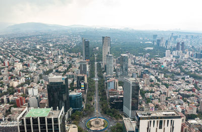 High angle view of buildings in city against sky