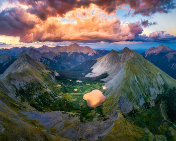 Scenic view of mountains against sky during sunset