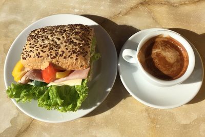High angle view of served food on table