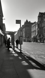 Full length of woman walking in city