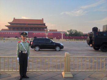 Side view of man walking in city