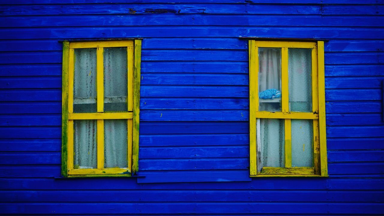 blue, building exterior, built structure, architecture, door, outdoors, yellow, no people, day, close-up