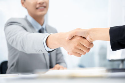 Low angle view of man holding hands