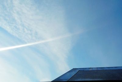 Low angle view of built structure against blue sky