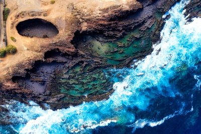 Full frame shot of rock in sea