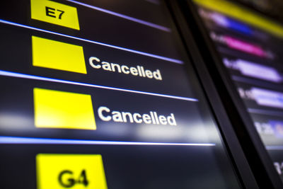 Close-up of information sign on airport