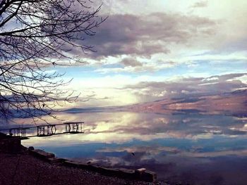 Scenic view of sea against cloudy sky